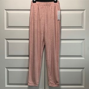 Velour jogging pants with elastic and pockets. Brand new with TAGS.
